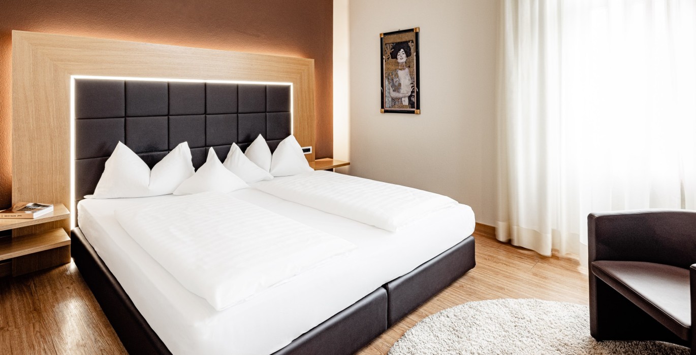 Bild einer Suite im Meranerhof Wunderschönes Schlafzimmer einer Suite im Meranerhof